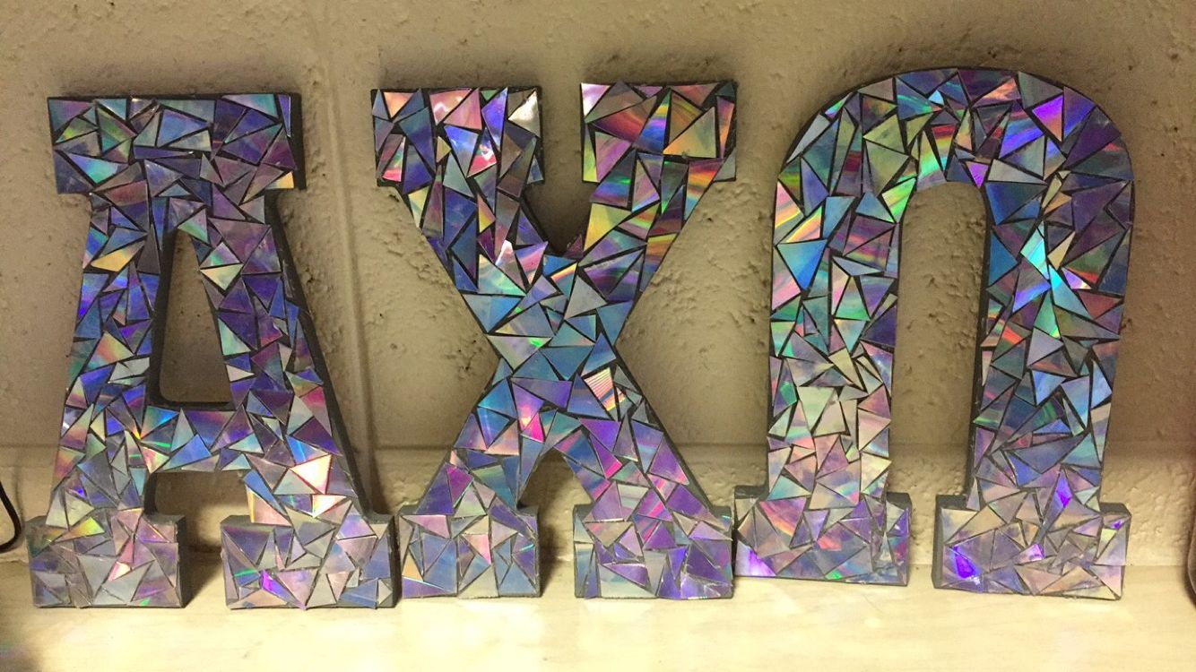 Alpha chi omega Greek letters made with cut up CDs -   23 greek letter crafts
 ideas