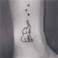 07 Awesome Small Tattoo Ideas for Women -   19 elephant tattoo lotus
 ideas