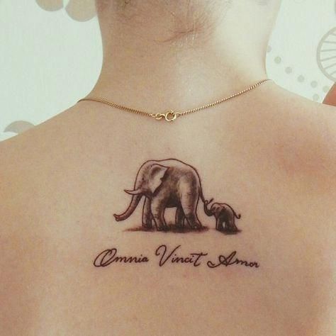 Elephant Tattoos On Foot #Tattoosonback -   19 elephant tattoo lotus
 ideas