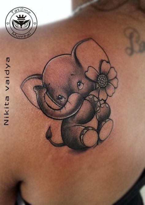 cute-baby elephant-tattoo-cartoon-tattoo-black-and-grey-tattoo-dreaming-elephant-tattoo-by-best-tattoos-artist-in-india-nikita-vaidya tat2me -   19 elephant tattoo lotus
 ideas