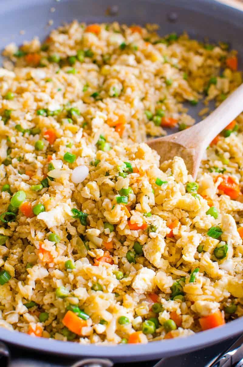 Super easy 15 minute Cauliflower Fried Rice Recipe with fresh or frozen cauliflower. It is SO TASTY my kids thought it was real rice. -   22 riced cauliflower recipes
 ideas