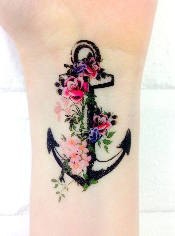 Amazing Black Anchor With Flowers Tattoo On Wrist ~ Girly Tattoo Ideas #39 -   23 cross anchor tattoo
 ideas