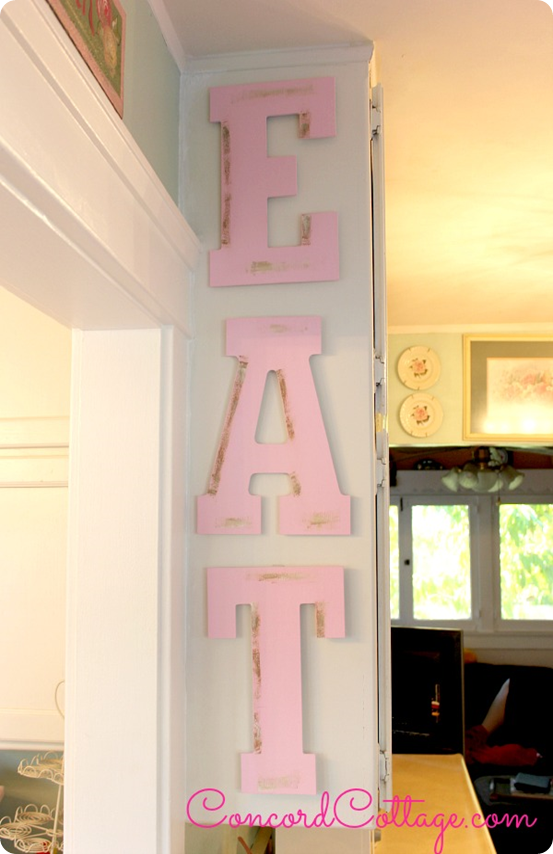 Pretty in Pink “EAT” Wall Letters -   23 pink kitchen decor
 ideas