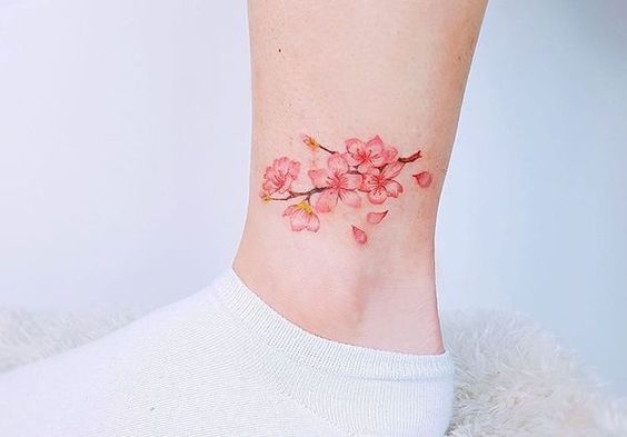 Colorful cherry blossom branch tattoo on the ankle -   24 cherry blossom ankle tattoo
 ideas