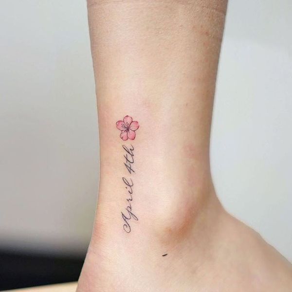 Small memorial cherry blossom tattoo design on the ankle -   24 cherry blossom ankle tattoo
 ideas