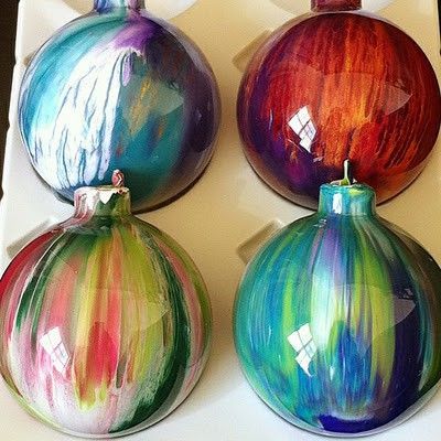Put drops of acrylic paint inside clear bulbs, then shake. So beautiful! Cant wait for christmas!! Kids will love this -   24 diy ornaments family
 ideas