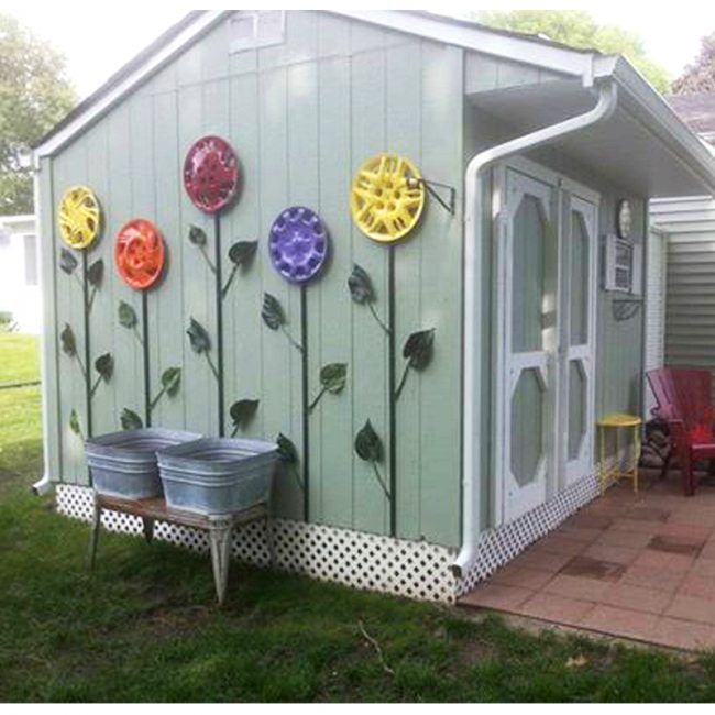 A DIY Hubcap Flower Garden can brighten up any yard! -   24 flower garden crafts ideas