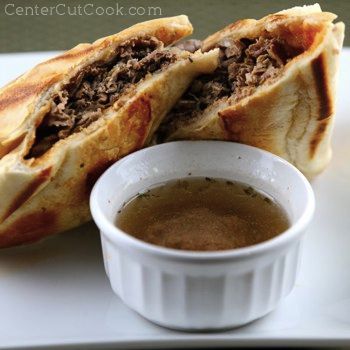 Everyday French dip sandwich. 1 pound shaved deli roast beef (or Italian Beef if it’s available) sliced thin  4 hoagie or Italian rolls  8 slices provolone cheese  3 cups beef broth/stock  1 teaspoon dried oregano  1 teaspoon dried basil  1/2 teaspoon red pepper flake  1/2 teaspoon black pepper 1/4 cup A1 Steak Sauce  1/2 teaspoon garlic powder 2 teaspoons dijon mustard  1 tablespoon butter -   25 shaved beef recipes
 ideas