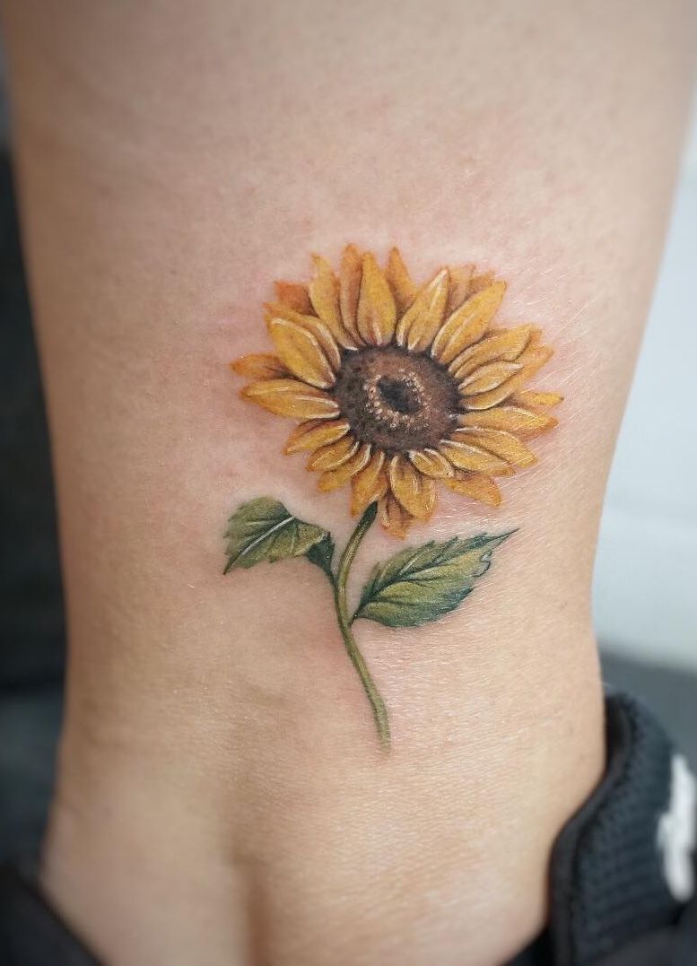 Celebrate the Beauty of Nature with these Inspirational Sunflower Tattoos -   13 unique tattoo feathers
 ideas
