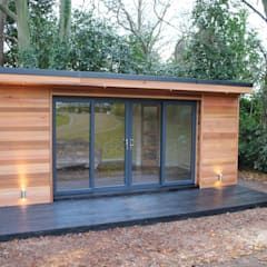 'the crusoe classic' - 6m x 4m garden room / home office / studio / summer house / log cabin / chalet: study/office by crusoe garden rooms limited -   14 garden house office
 ideas