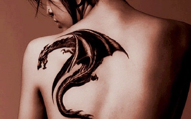 Latest 50 Meaningful Dragon Tattoo Designs for Men and Women -   18 dragon tattoo man
 ideas