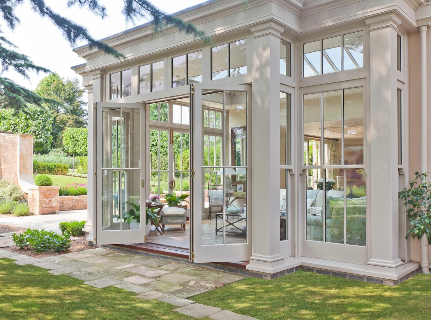 Orangery with bi-fold doors: conservatory by vale garden houses -   19 vale garden house
 ideas