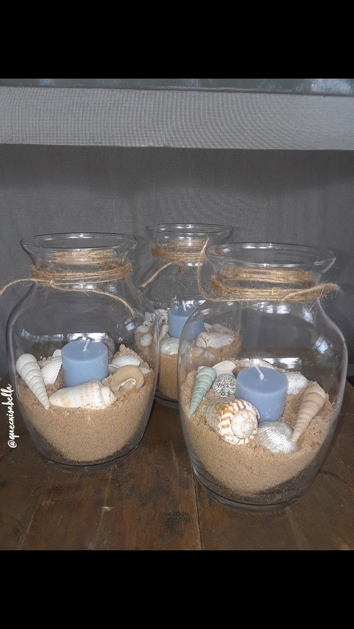 Made my own centerpieces for my beach themed Quinceanera !! Found the shells, candles, and vases all at the dollar tree ! -   22 beach crafts wedding
 ideas