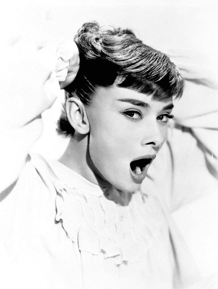 Audrey Hepburn yawning, 1950s -   11 holiday Girl audrey hepburn
 ideas