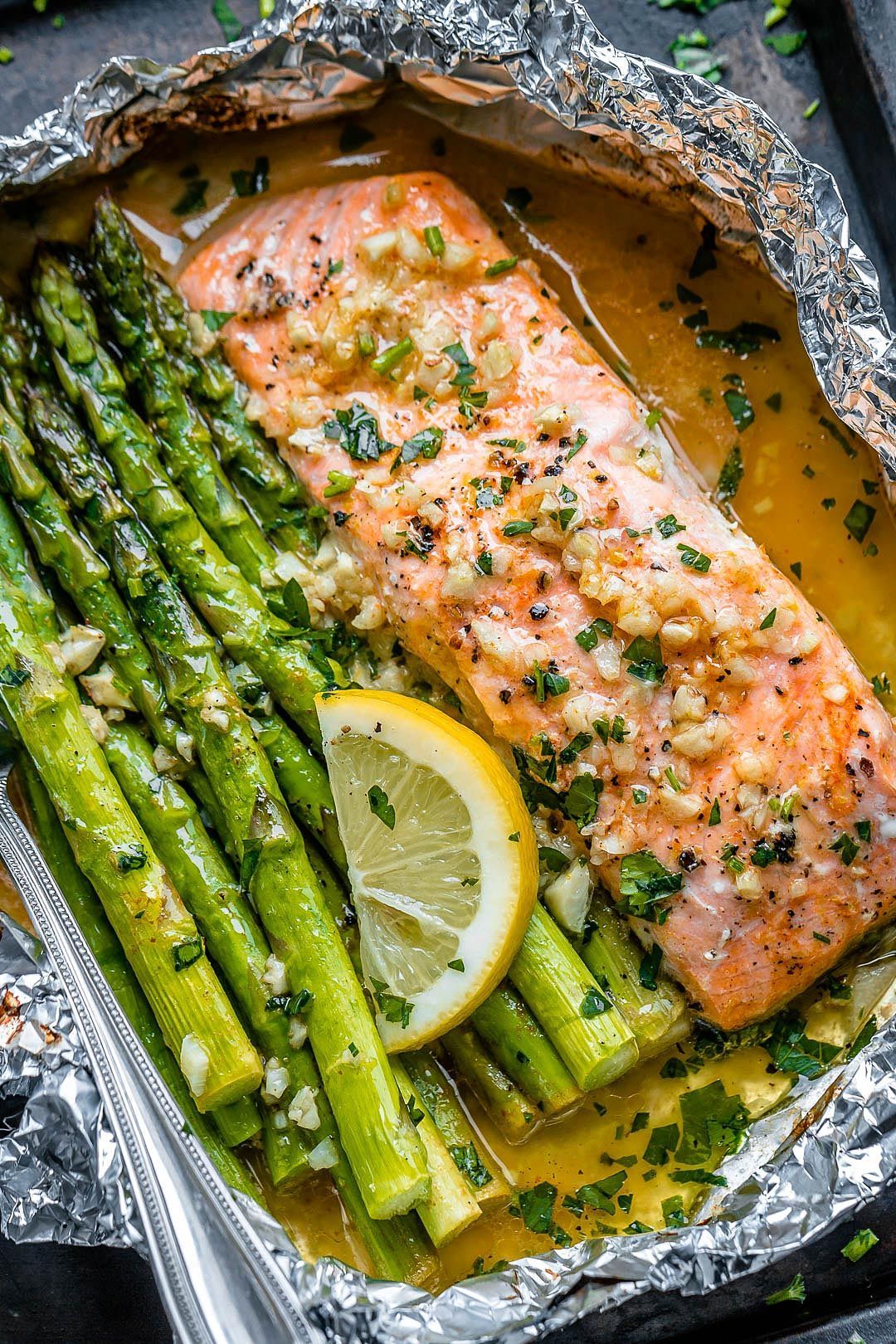 Salmon and Asparagus Foil Packs with Garlic Lemon Butter Sauce -   14 healthy recipes Salmon dishes ideas