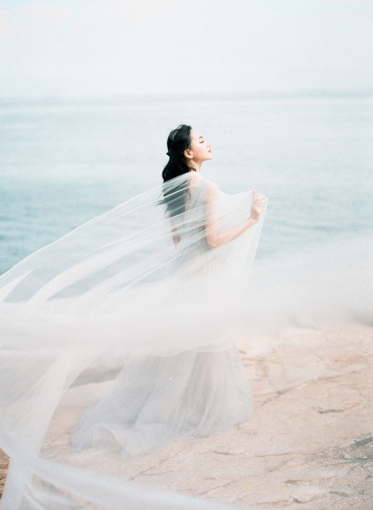 Ocean Blues Inspired This Ethereal Bridal Shoot on a Hong Kong Cliffside -   14 wedding Blue ocean ideas
