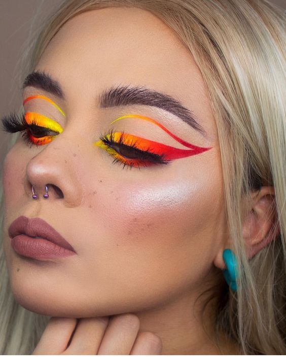 You're Going To See This Neon Cat Eye Look All Spring Long, So Here's How To Pull It Off - Society19 -   15 makeup Looks festival ideas