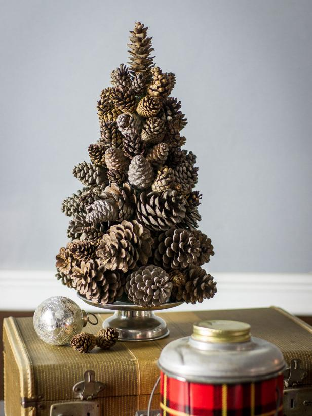 Turn Pine Cones Into a Tabletop Christmas Tree -   18 rustic tree topper pine cones ideas
